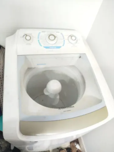 Máquina de lavar com defeito