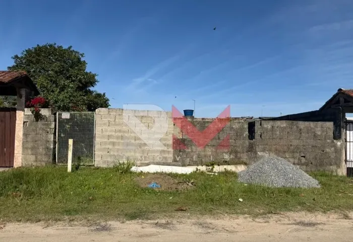 Meio lote lado praia escriturado em itanhaem