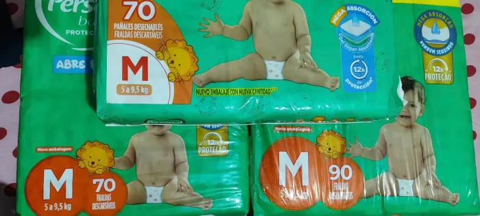 Vende-se ou troca 3 pacotes de fralda personal tamanho M, por tamanho G 