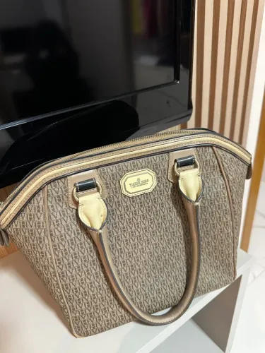 Bolsa original Victor Hugo, modelo Corsa, feita em lona e couro.