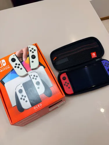 Nintendo Switch OLED + acessórios