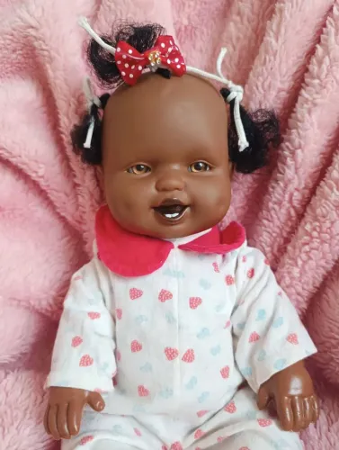 Boneca tererê e mais outra de brinde com pequeno avaria nos olhos a tererê está perfeita