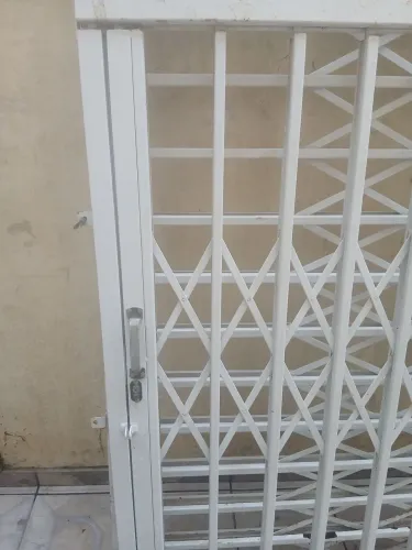 Grade de janela pantografica 