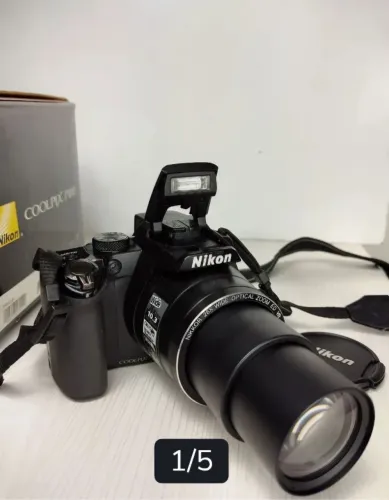 câmera semi-profissional marca nikon, modelo p100, em ótimo estado, sem avarias leia