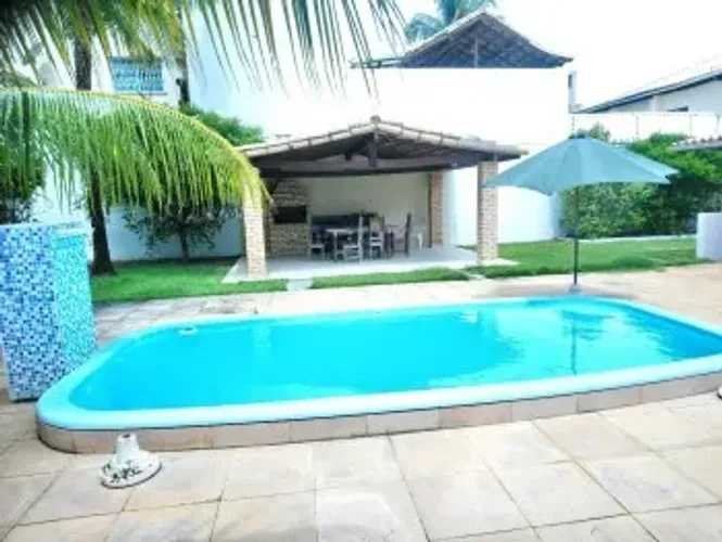 Casa duplex, frente mar, em condomínio, 5/4, 3 suítes, 6 garagens, piscina e churrasqueira