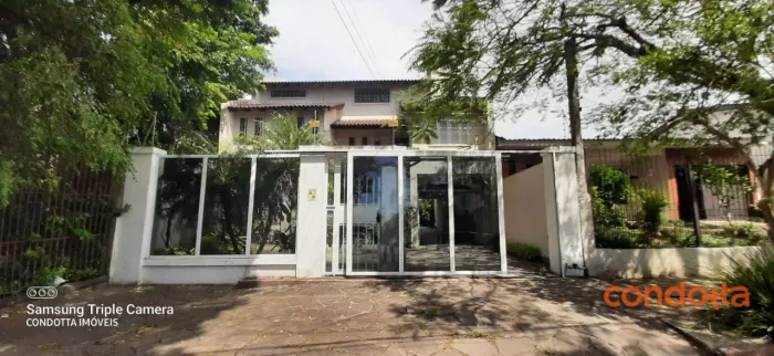 Casa com 6 dormitórios para alugar, 400 m² por R$ 7.850,01/mês - Teresópolis - Porto Alegr