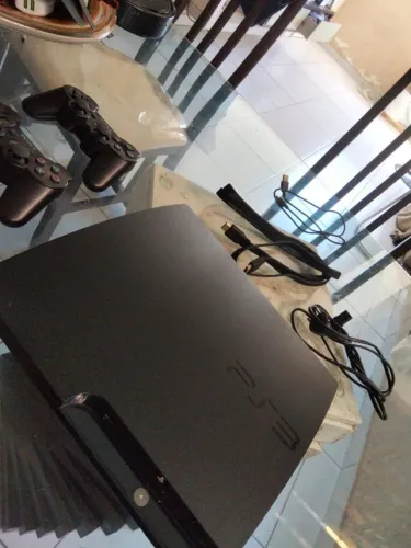 PS3 com controles