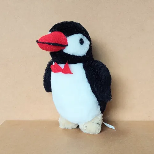 brinquedo - pelúcia pinguim gravata borboleta (usado)