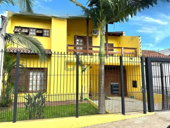 Casa com piscina e 4 quartos à venda no bairro Passo das Pedras - Porto Alegre