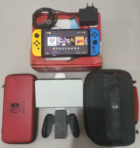 Nintendo OLED D&$bloqu@d0 Switch mais de 100 jogos instalados!