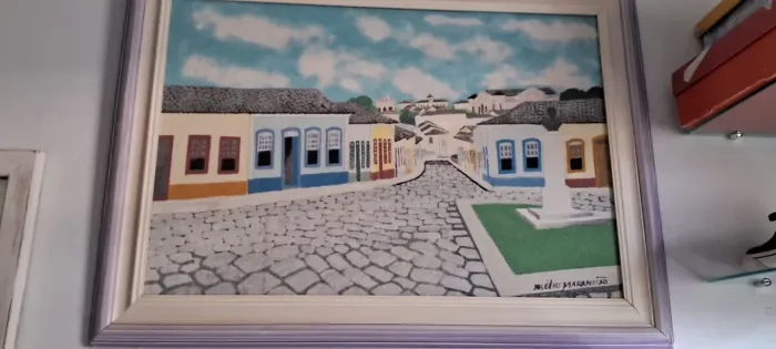 Pintura original de Josélio Maranhão, pintura em areia retratando a cidade de Goiás,