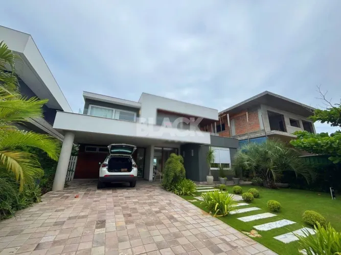 Casa em Condomínio 4 dormitórios à venda Ilhas Park Torres/RS