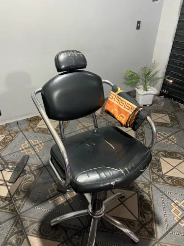 Cadeira de barbeiro(a)