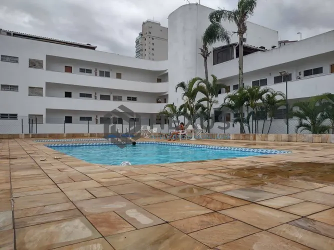 Apartamento com varanda e lazer na Praia da Enseada, Guaruja