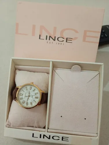 Relógio LINCE um mês de uso, pulseira em couro, a prova d'água.