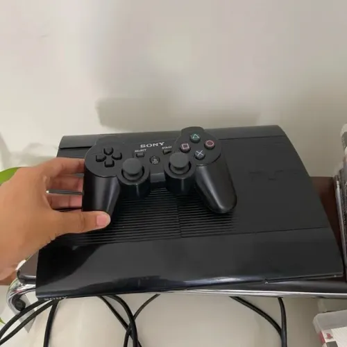 Ps3 super slim 500gb destravado com varios jogos ja nele, muito novo zerado!