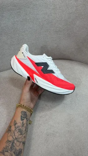 New balance Rebel branco e laranja 