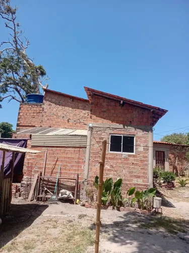Terreno com casa aproveite