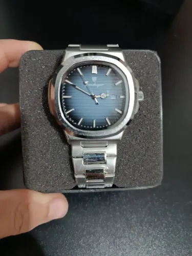 Relógio Poedegar com Pulseira de Prata Aço Inoxidável - Masculino - R$ 140
