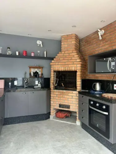 Casa com 4 dormitórios sendo 2 suítes à venda, 244 m² por R$ 1.600.000 - Condomínio Ibiti