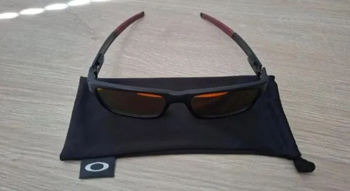 Óculos solar grau Oakley currency original