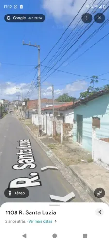 Terreno com casas e galpão