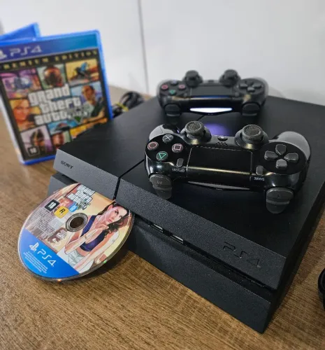 Ps4 Top demais, estado de novo, bem cuidado com 2 Controles e GTA 5 em CD, da desbloqueio