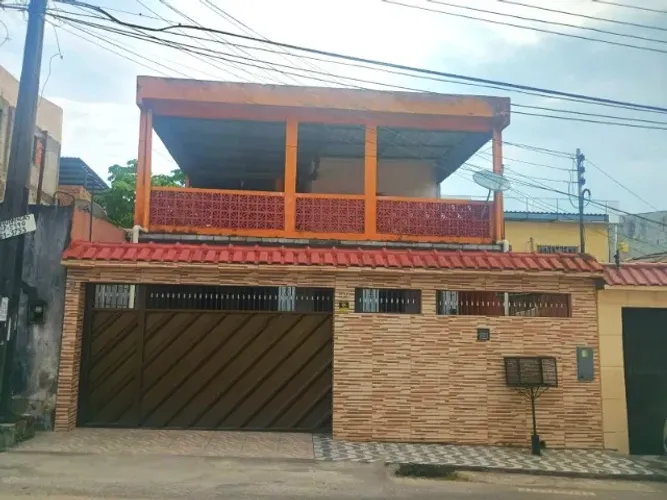 Casa com 5 quartos e 3 suítes