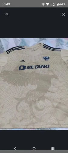 Camisa dourada maravilhosa do Galo Atlético mineiro.