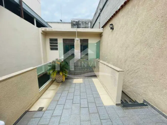 Casa Duplex Encantadora com Terraço e Segunda Casa - Oportunidade Única em Botafogo