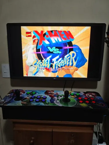 Fliperama portátil + tv de 32"