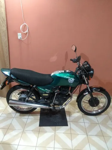 A moto está conservada e troquei algumas peças.
