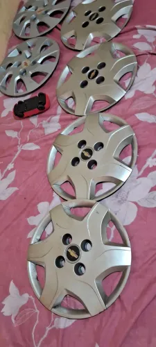 Calotas celta aro 13 originais e duas do onix ambas aro 13