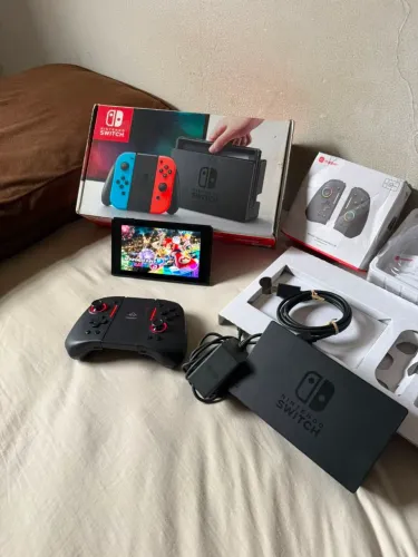 Nintendo Switch dsblq impecável ( aceita trocas) 