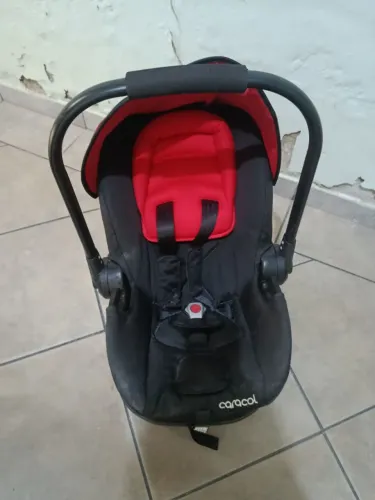 Bebê conforto Kiddo Caracol com suporte para carro em perfeito estado