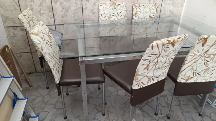 Mesa 6 cadeiras tampo vidro armação  inox