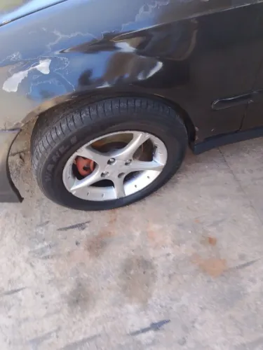 Vendo rodas SCORRO ARO 15 4 FUROS com 4 PNEUS ZERO BALA