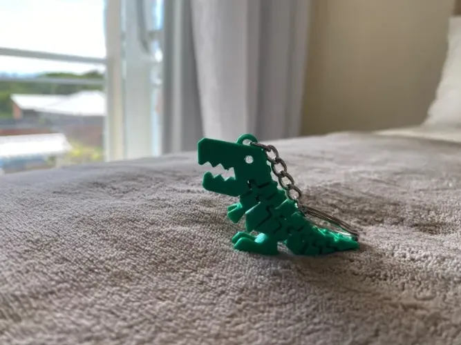 Kit 10 unidades - Chaveiro Dinossauro Articulado