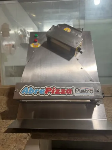 Máquina de abrir massa
