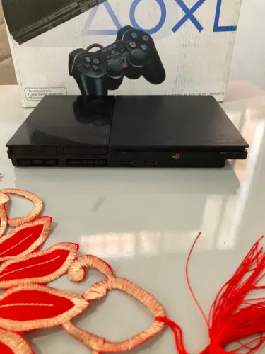 PlayStation 2 completo, 2 controles, varios jogos em midia fisica.