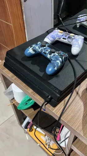 Ps4 com 8 jogos incluso já