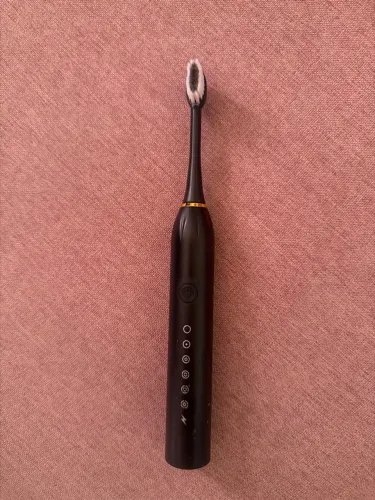 Escova de dente elétrica