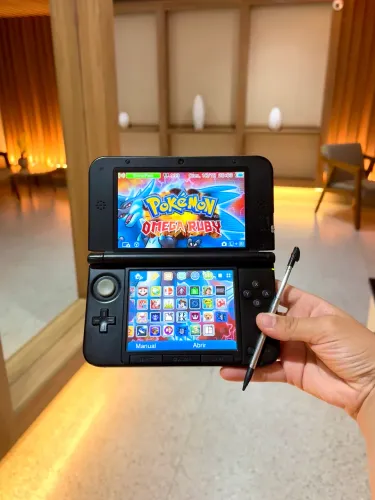 Nintendo 3ds Xl 64 gb com caixa e manual e muitos jogos como Pokémon Mario 