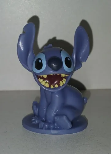 BONECO MINIATURA ORIGINAL LILO E STITCH SENTADINHO