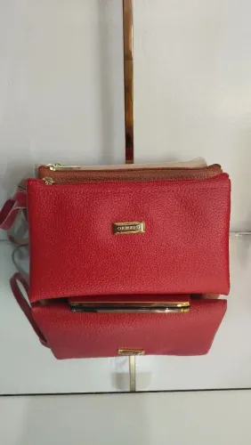 Nécessaire Couro Fino, disponível nas cores: vermelha, preta, nude e castor.