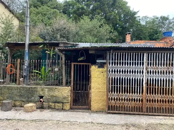 Casa 1 Dormitório na Serraria com Pátio Amplo e Garagem Automática - Excelente Terreno!