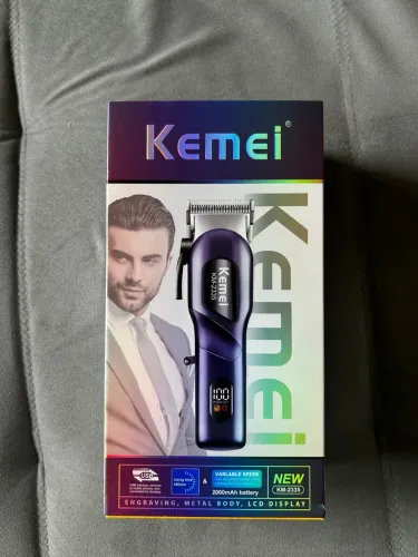 Máquina Kemei para corta cabelo