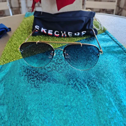 Óculos de Sol, feminino, marca Skechers, Novo, original, importado lentes degradê.