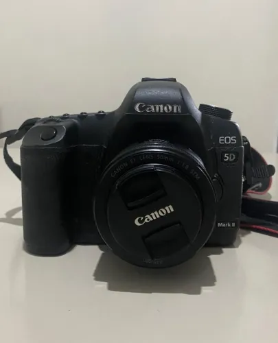 Câmera + Lentes + Flash + Acessórios. Leia a descrição