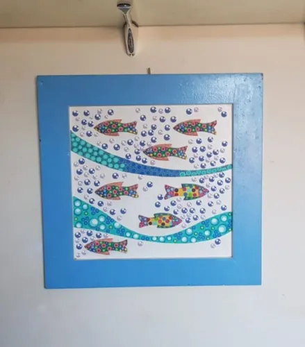 Quadro azul peixes coloridos